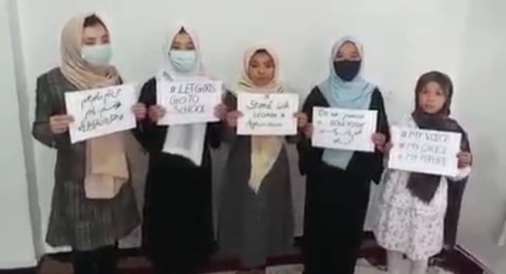 Afghan girls indoors protest against the closure of girls’ schools