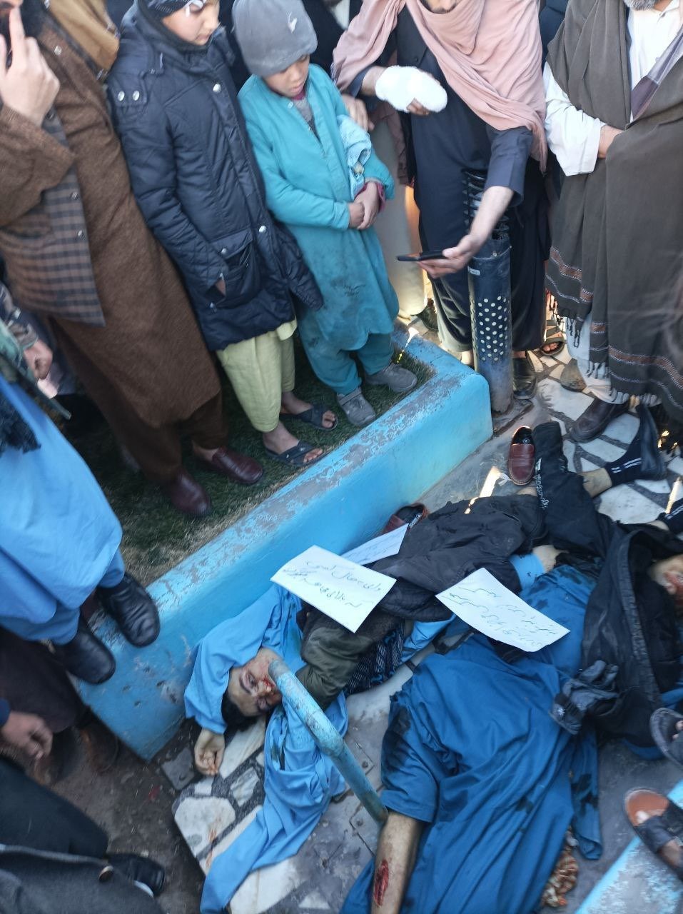 Showing the dead bodies accused of theft in Herat by the Taliban